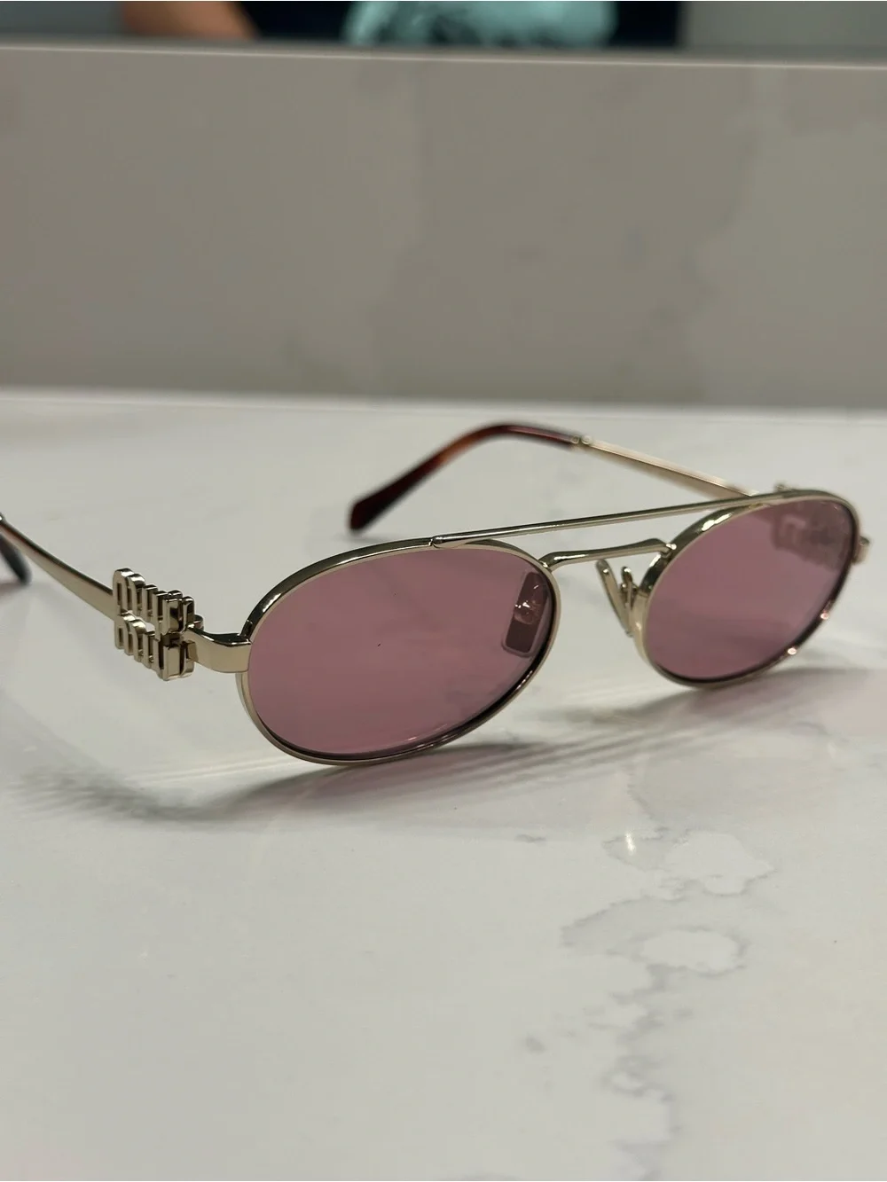 Miu Miu Gold Frame Sunglasses with Pink Lenses